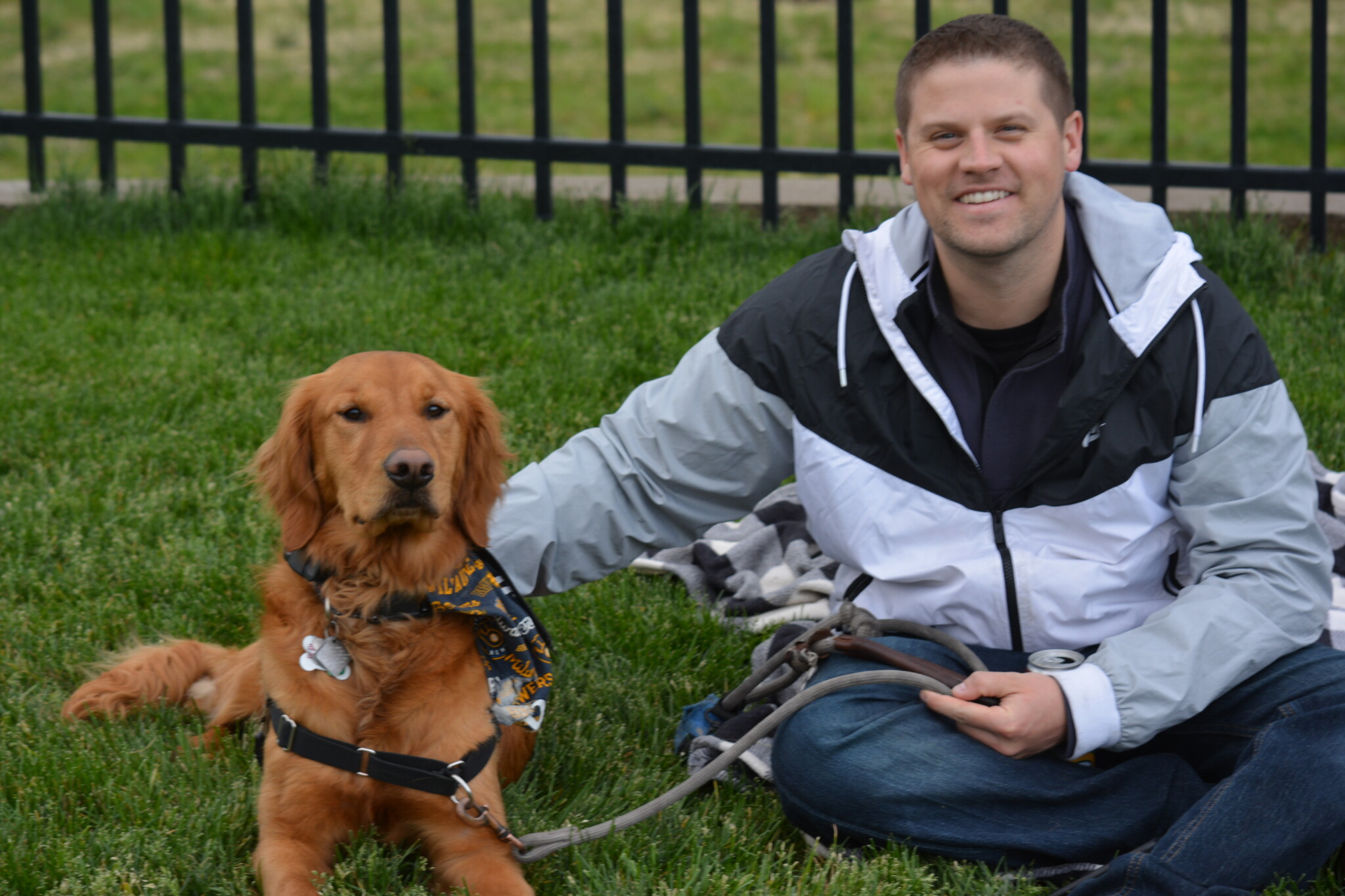 Mans best friend at a DockHounds game