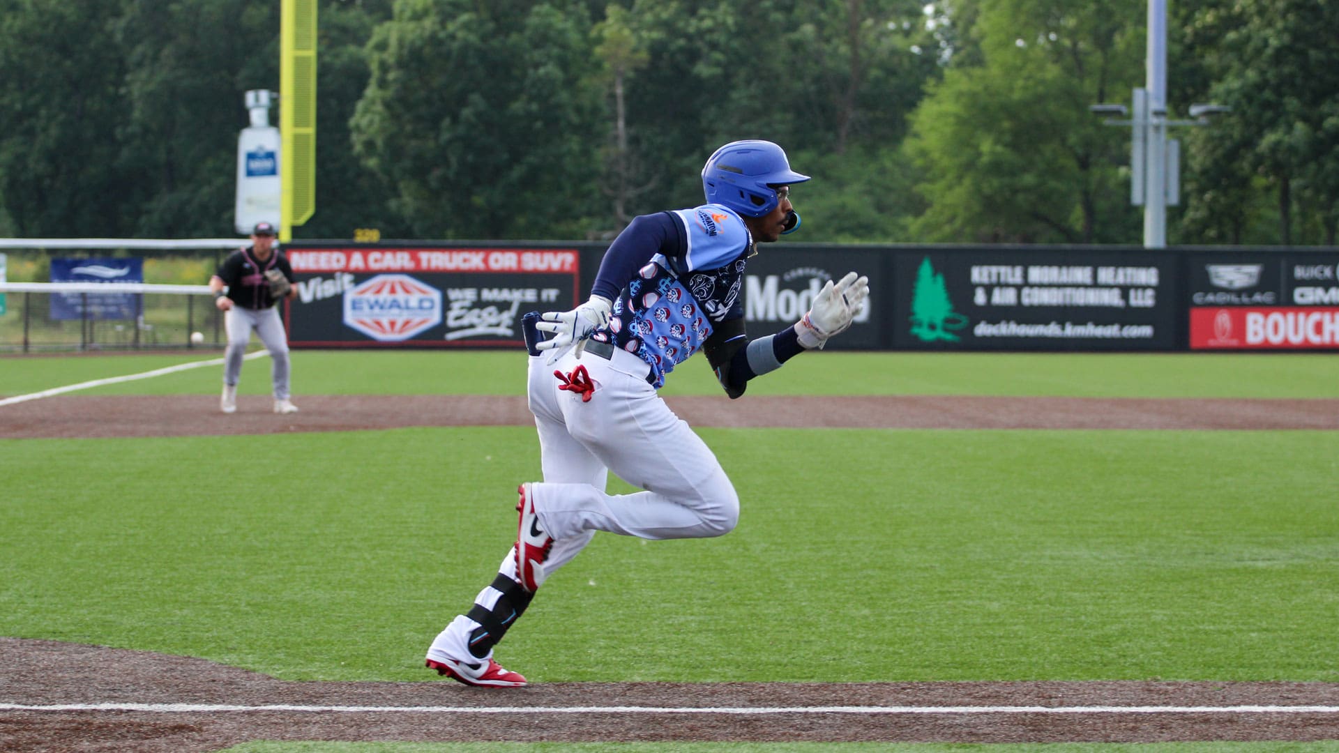 Demetrius Sims legs out a single.